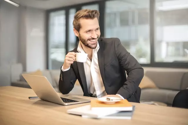 Businessman Taking a Coffee